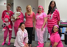 KaTom family shows Breast Cancer Awareness in pink
